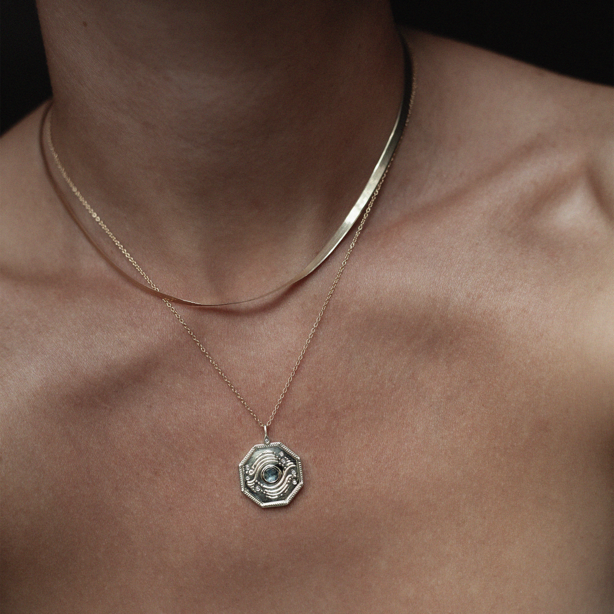 blue sapphire gold charm