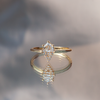 Geometric diamond engagement ring, made with 14k yellow gold.