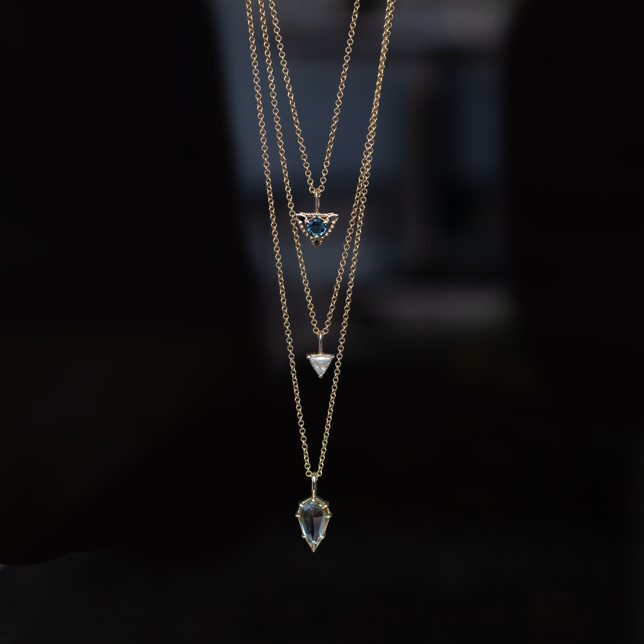 Sapphire trillium gold charm