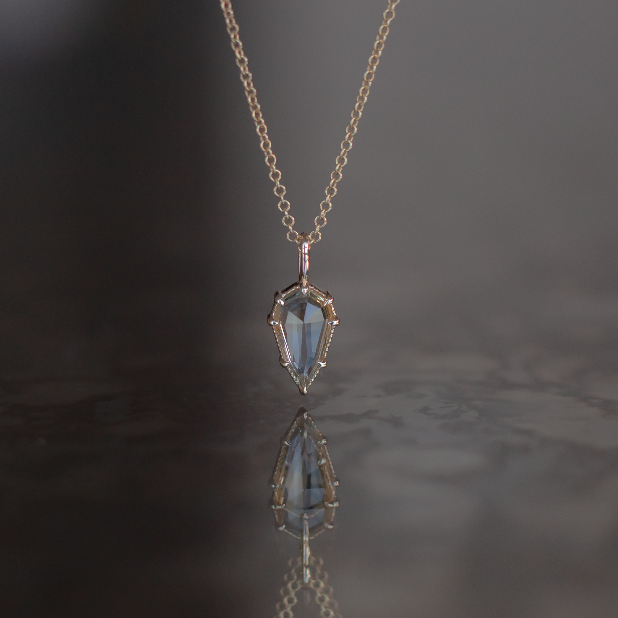 green sapphire 10k gold charm