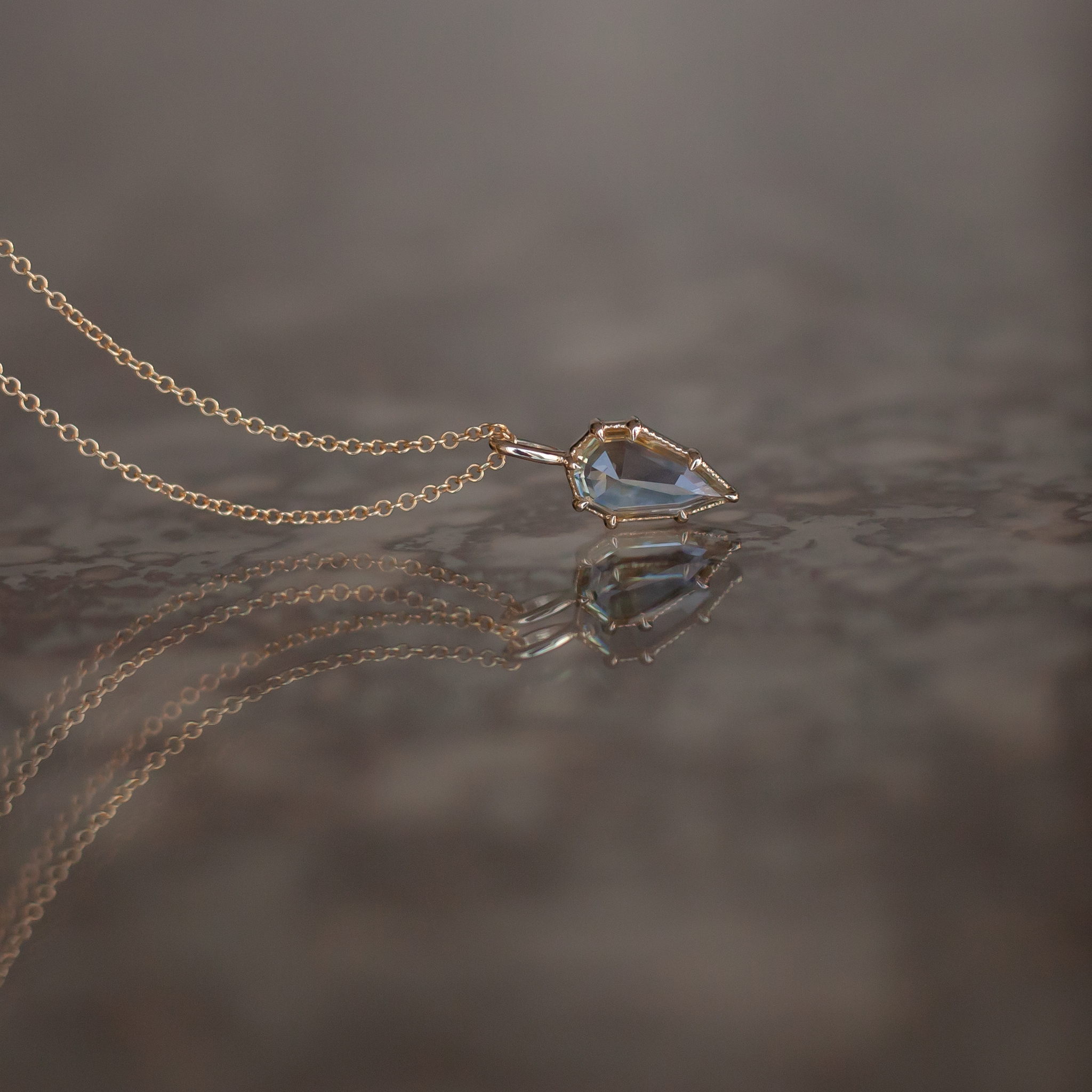 green sapphire 10k gold charm