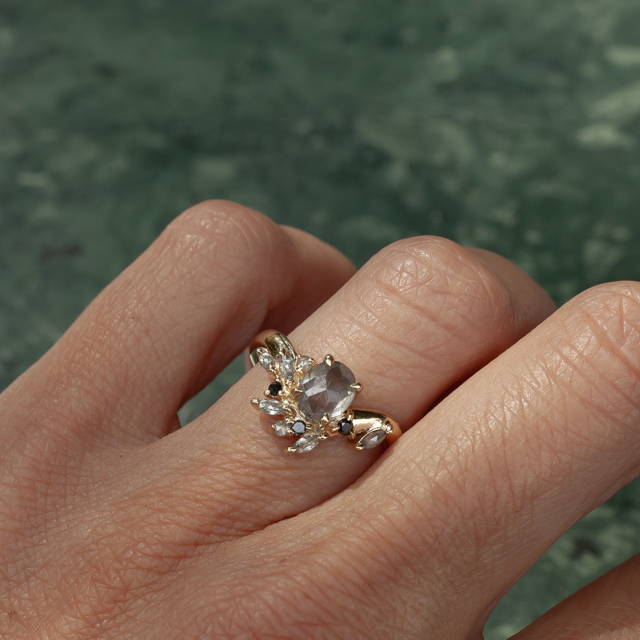 Oval shape salt and pepper diamond ring