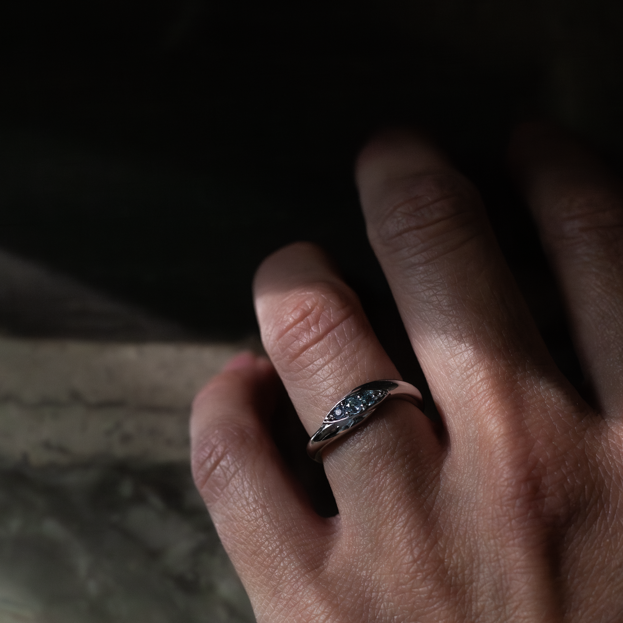 Three stone white gold ring