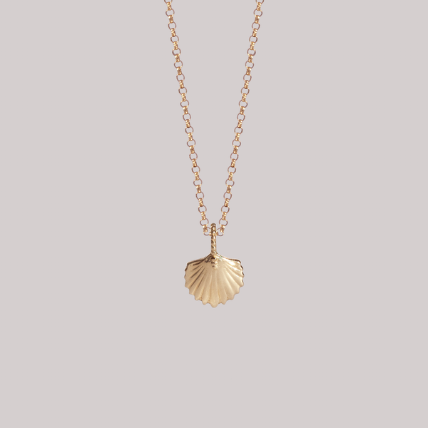 gold sea shell charm