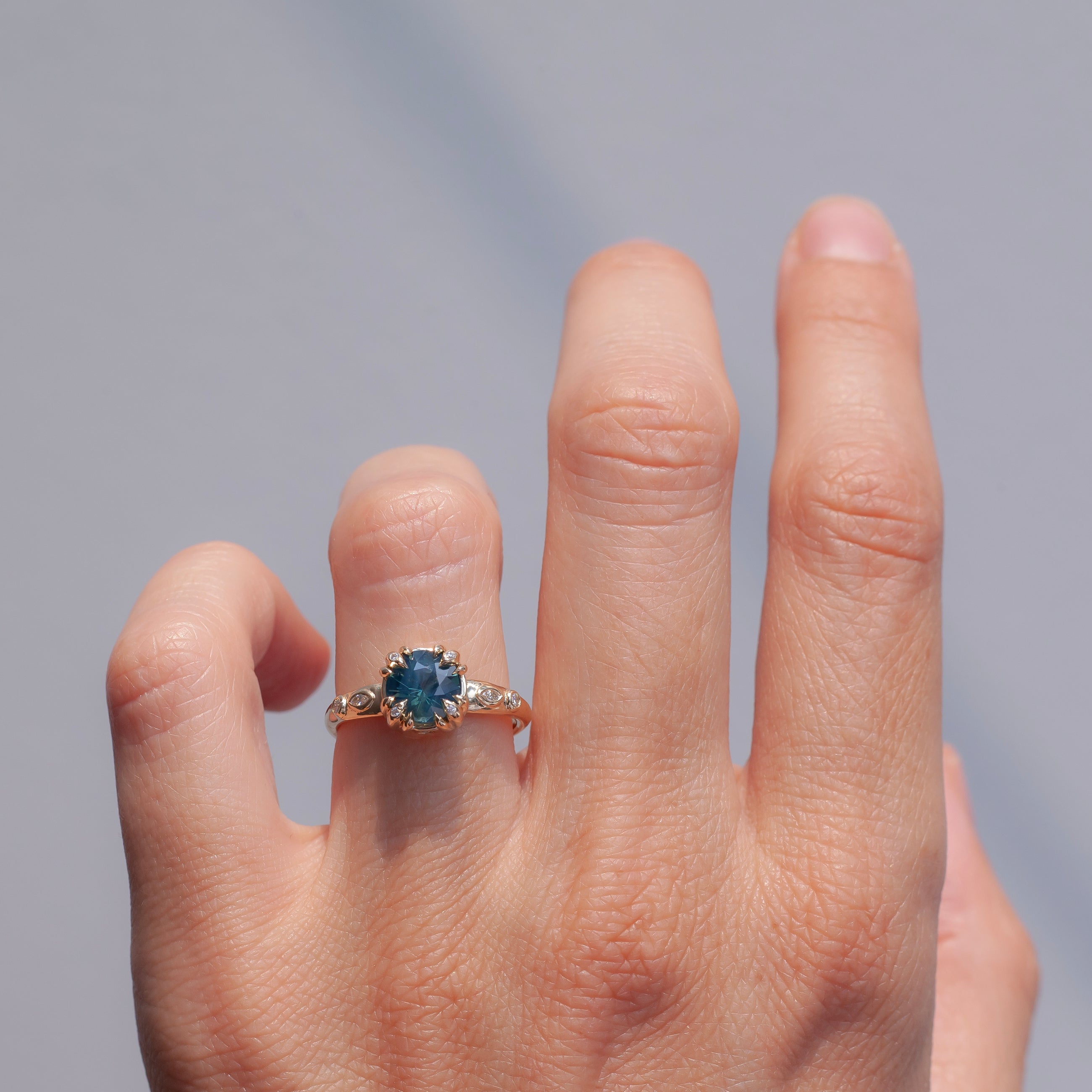 teal sapphire engagement ring