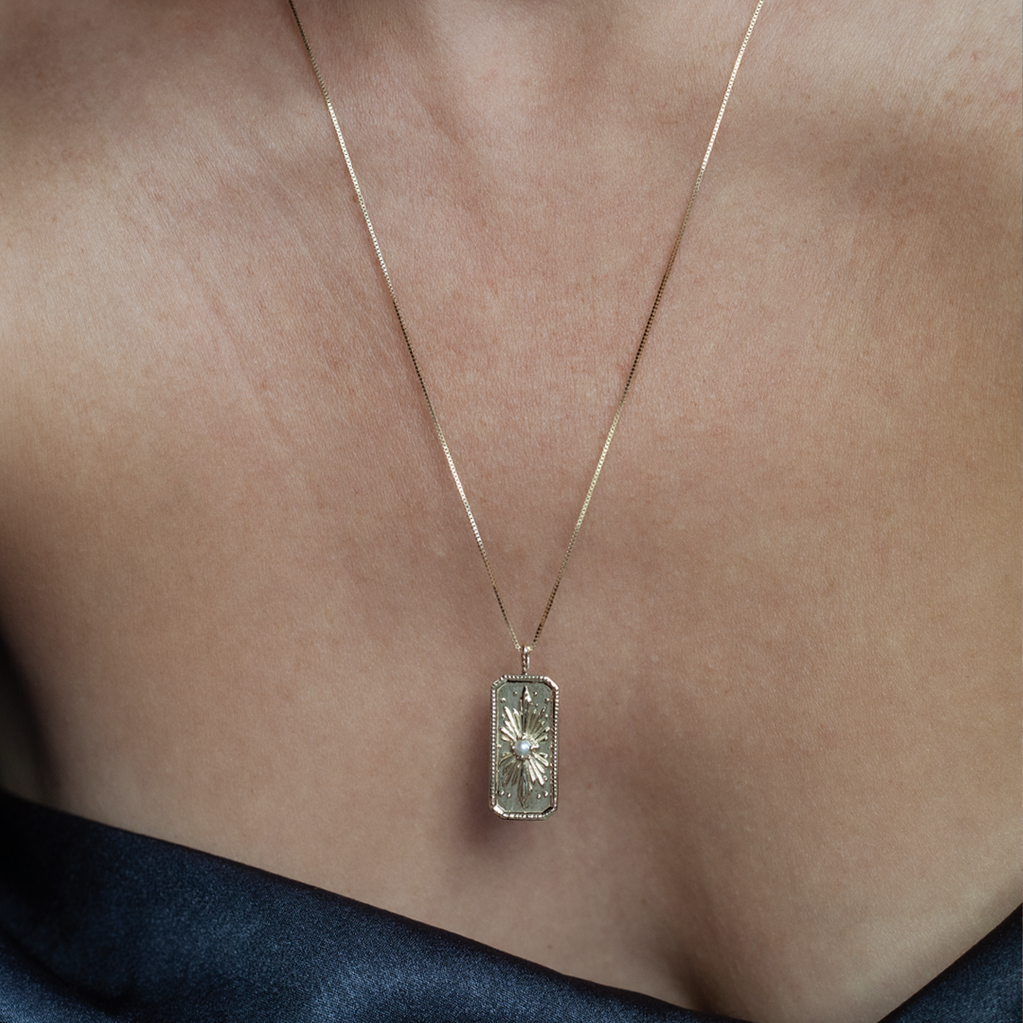 BEAMING UP — Pearl Sunburst Charm