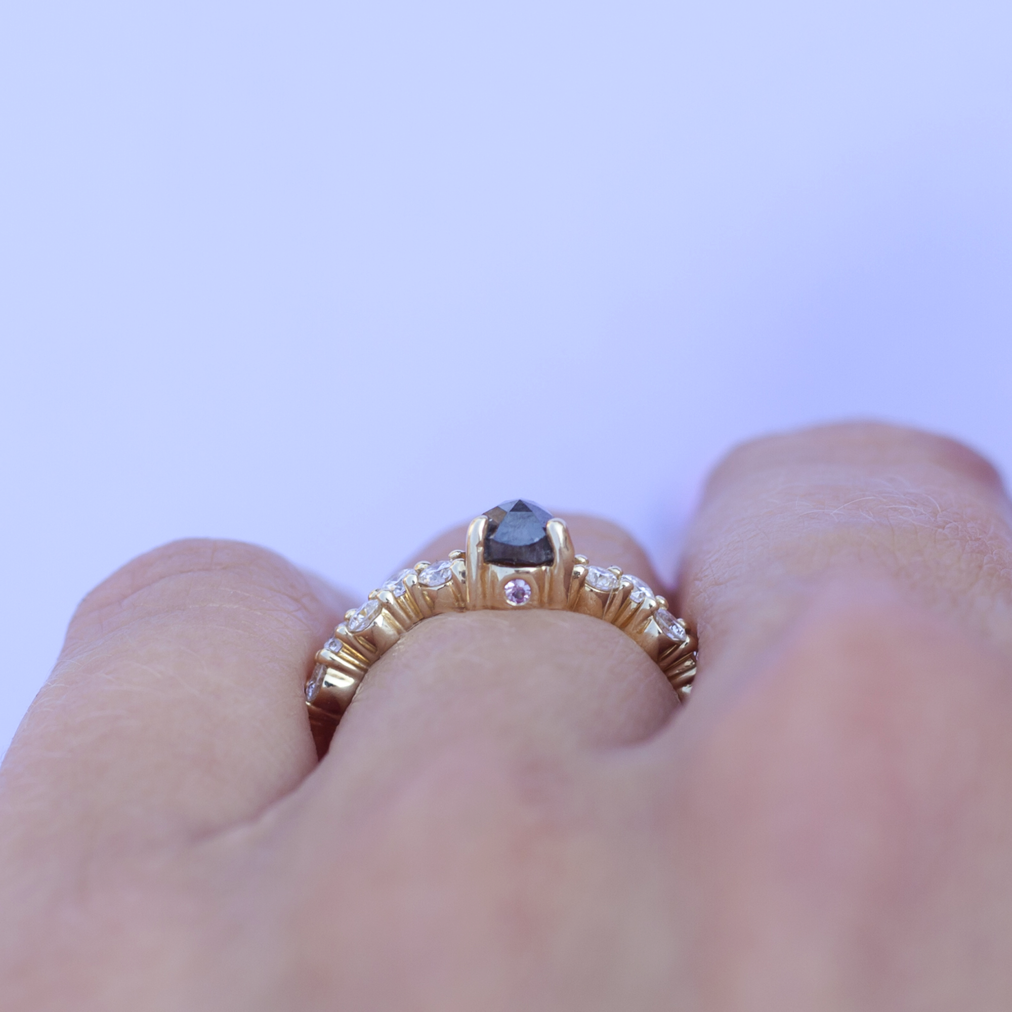 Unique salt and pepper rose cut pear diamond engagement ring, on a diamond cluster band, prong setting, made in 14k or 18k yellow gold.