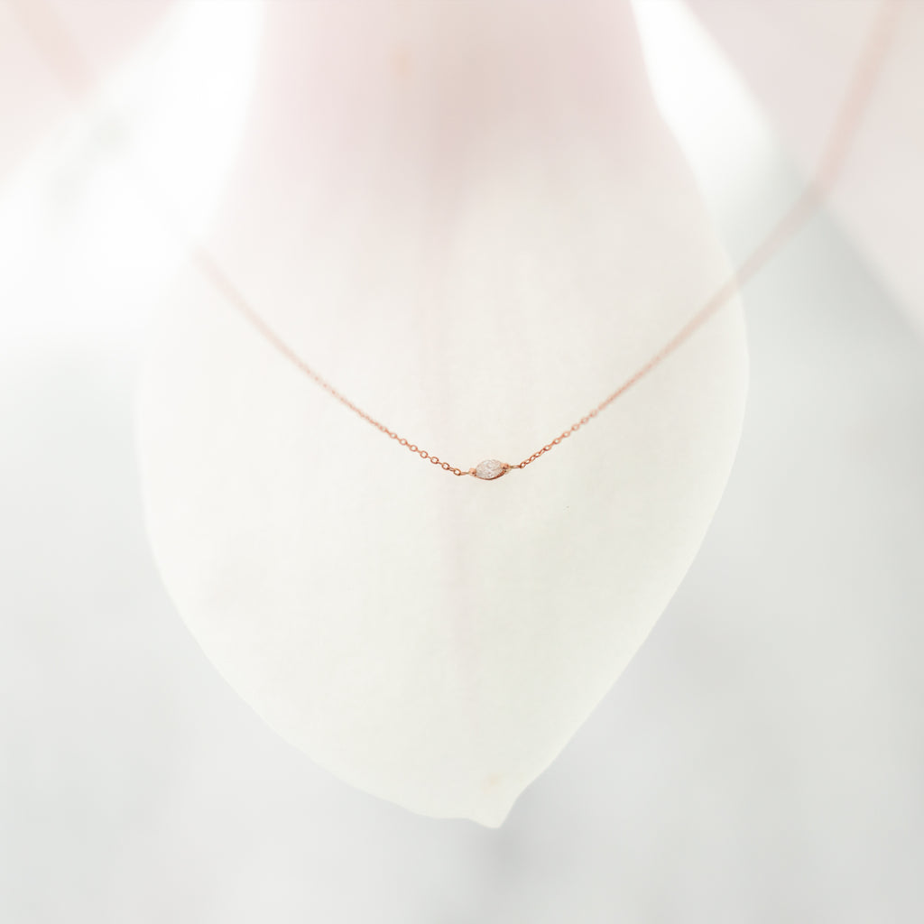dainty gold necklace with diamond
