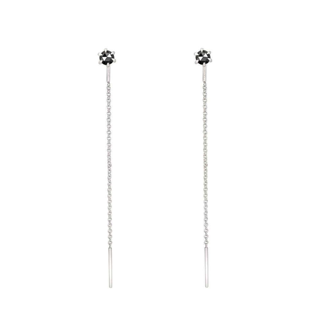 Delicate black round rose cut diamond threaders, ideal for threading through multiple piercings, feature a six claw prong setting, using 14k or 18k white gold.