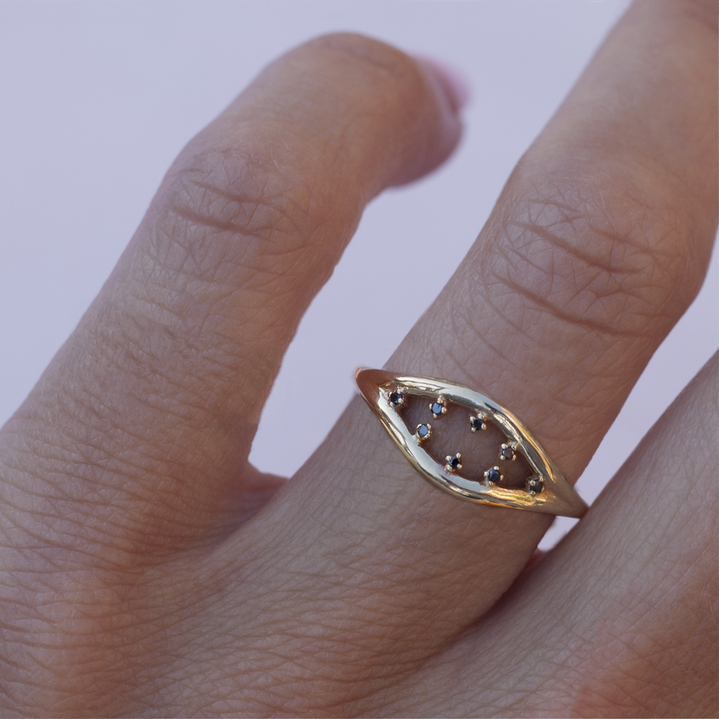 Inspired by the evil eye, split double band everyday gold ring with black diamonds, made in 14k or 18k gold.