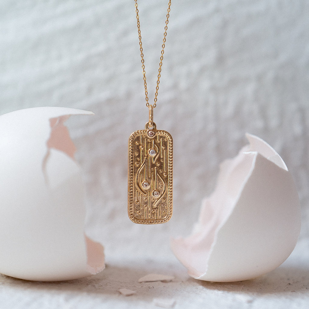 Dainty rectangle pendant charm, sound of creation, featuring delicate waves with sacred light code, encrusted with the tiniest of white and champagne diamonds, made in 14K or 18K yellow gold.