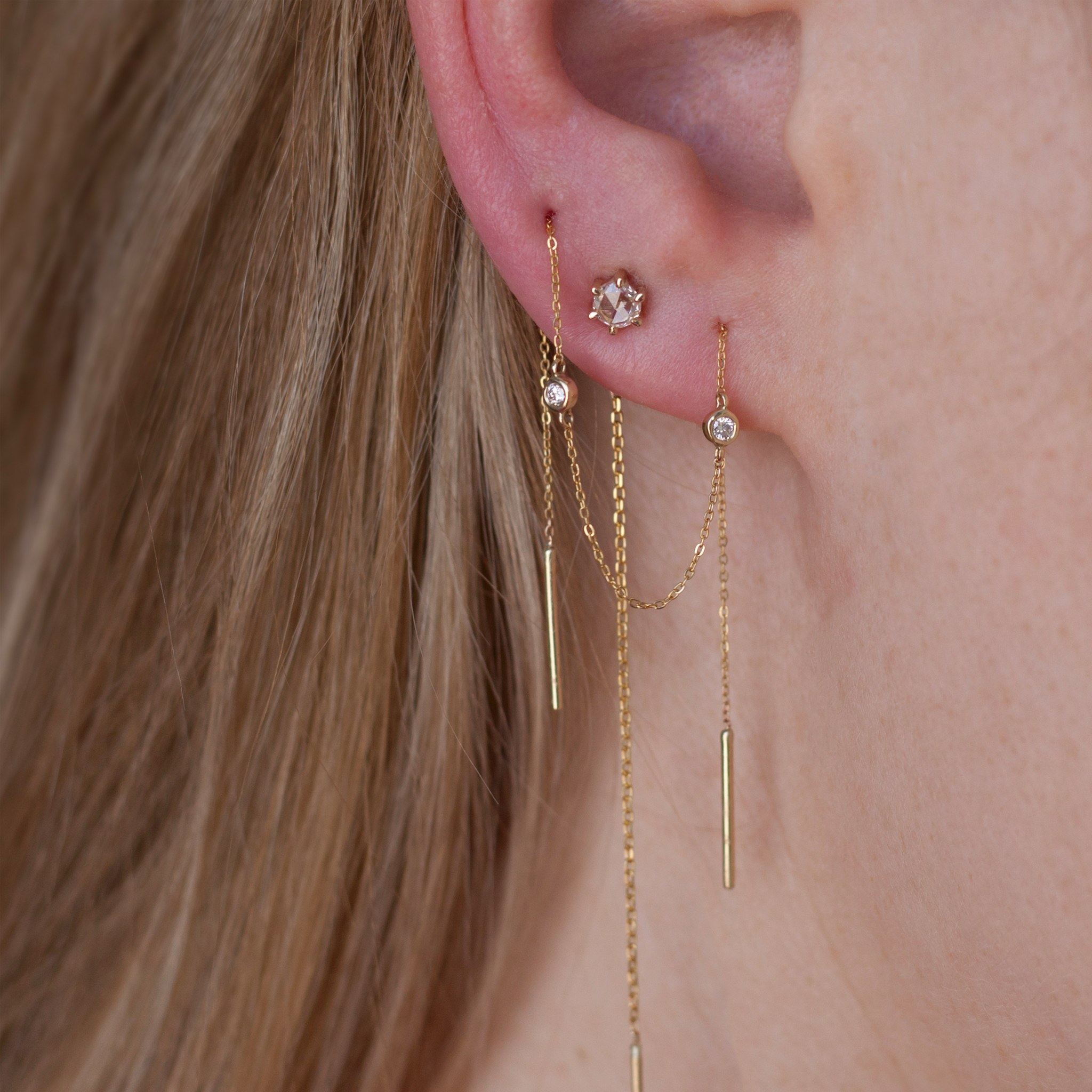 Delicate diamond gold threaders, ideal for threading through multiple piercings, using 14K gold.