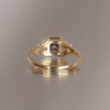  Emerald cut salt and pepper diamond engagement ring with split band, made with rose cut diamonds in 14k yellow gold.