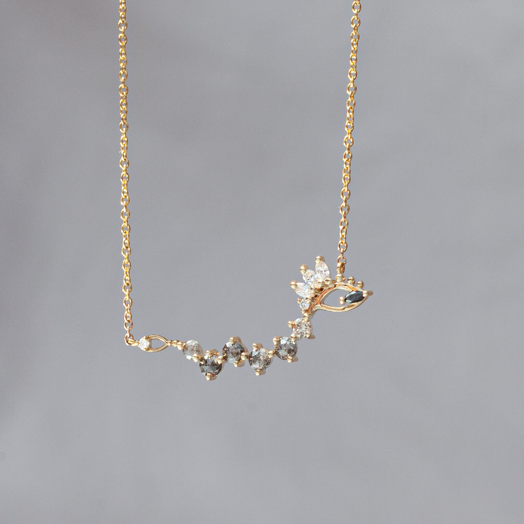 Gold snake necklace with round salt and pepper rose cut diamonds, champagne diamonds, and black diamonds, made in 14k solid gold.