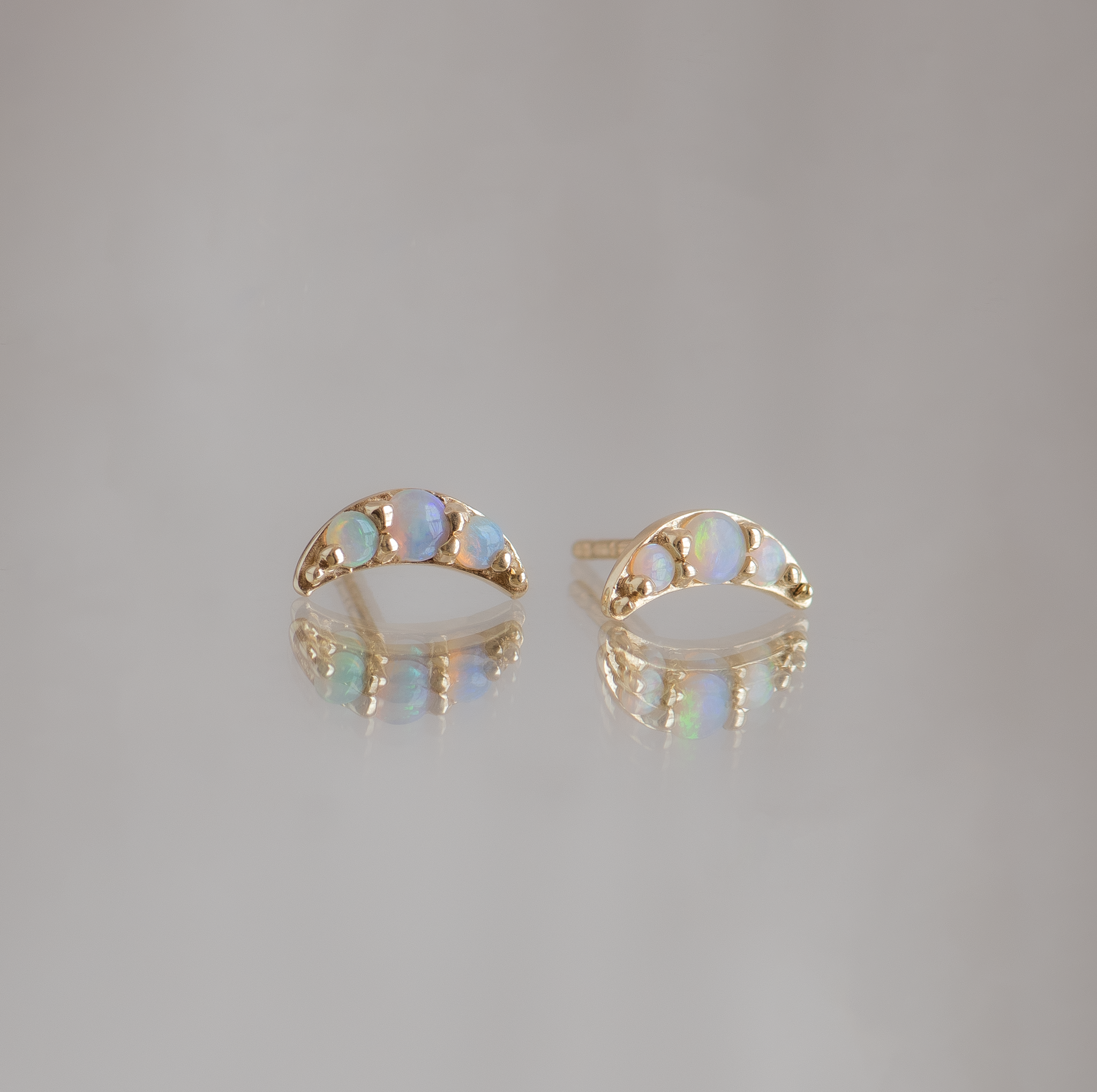 Half moon opal everyday earrings, made in 14k yellow gold.