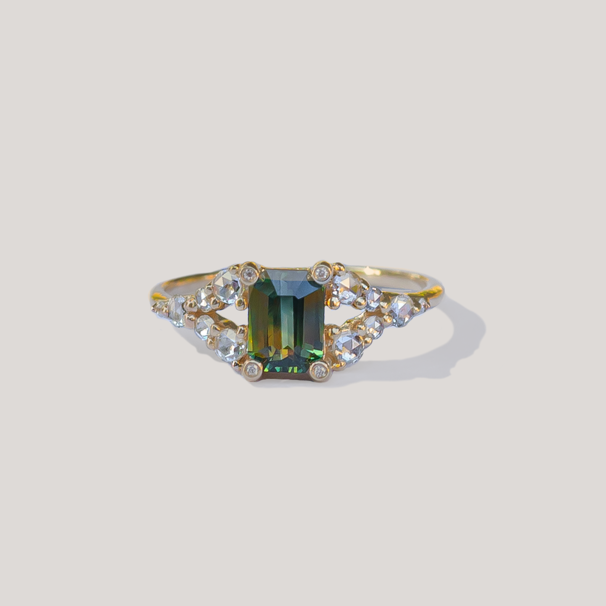 Teal sapphire engagement ring