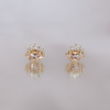 Morganite diamond earring stud featuring a diamond crown, made in 14k gold. 