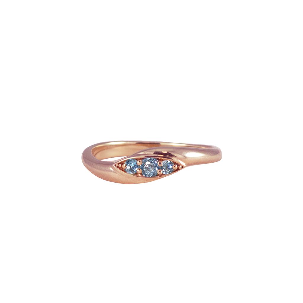 Three stone rose gold ring