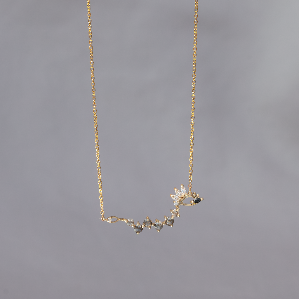 Gold snake necklace with round salt and pepper rose cut diamonds, champagne diamonds, and black diamonds, made in 14k solid gold.