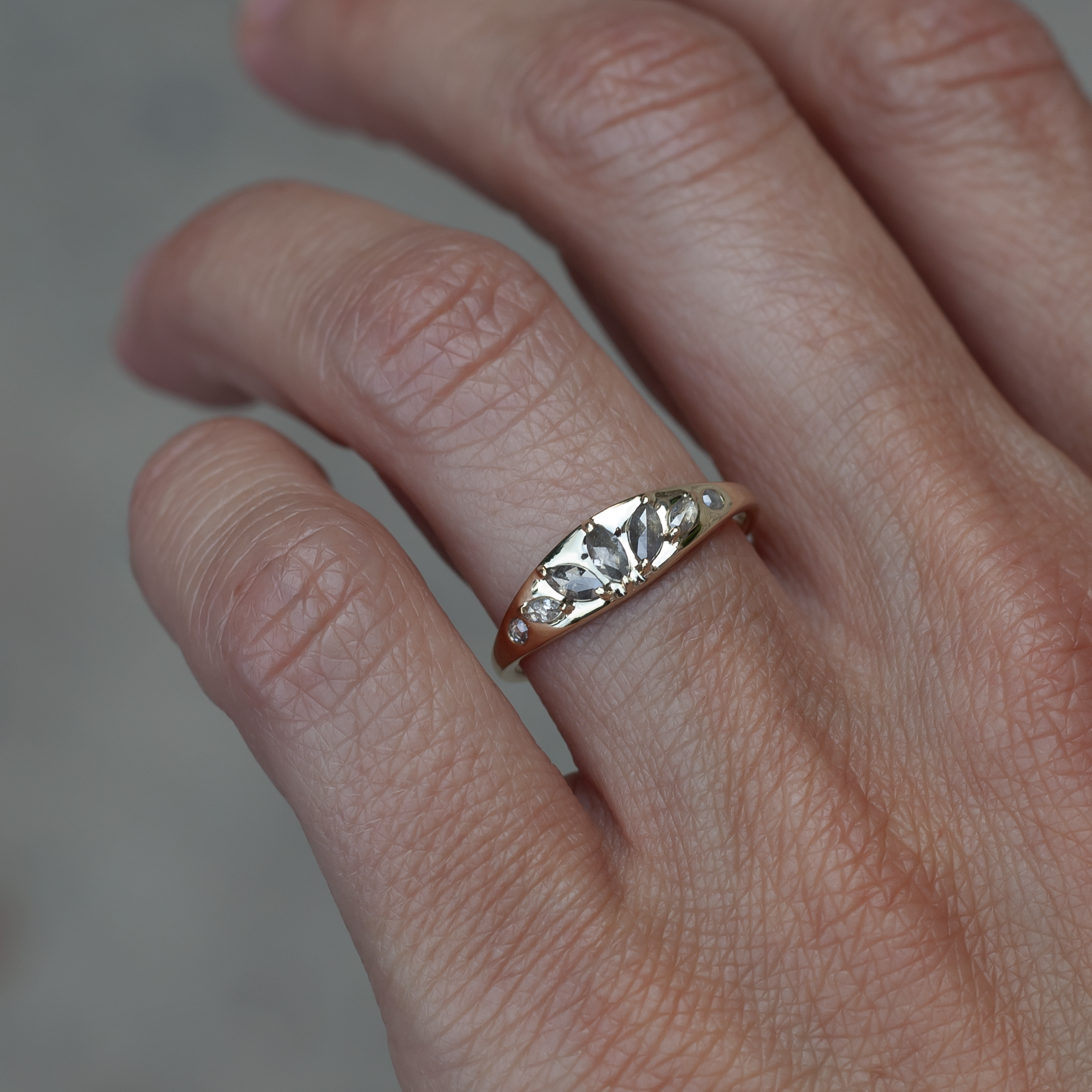 Gold signet ring with diamonds.