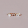 Contemporary take on a traditional marquise engagement ring featuring an East-West marquise Morganite centre stone. The centre stone is surrounded with a diamond crown of marquise and round brilliant diamonds. Made in solid 14k or 18K yellow gold.