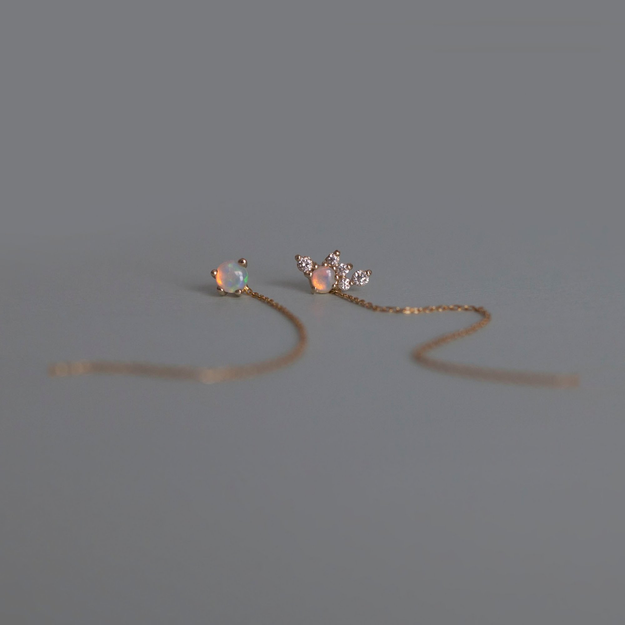 Cluster opal and diamond studs.