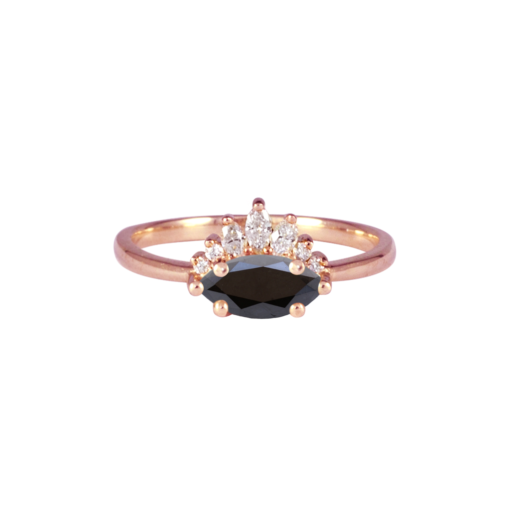 Contemporary take on a traditional marquise diamond ring features an East-West marquise black diamond. The centre stone is surrounded with a diamond crown of marquise and round brilliant diamonds. Made in solid 14k or 18K rose gold.