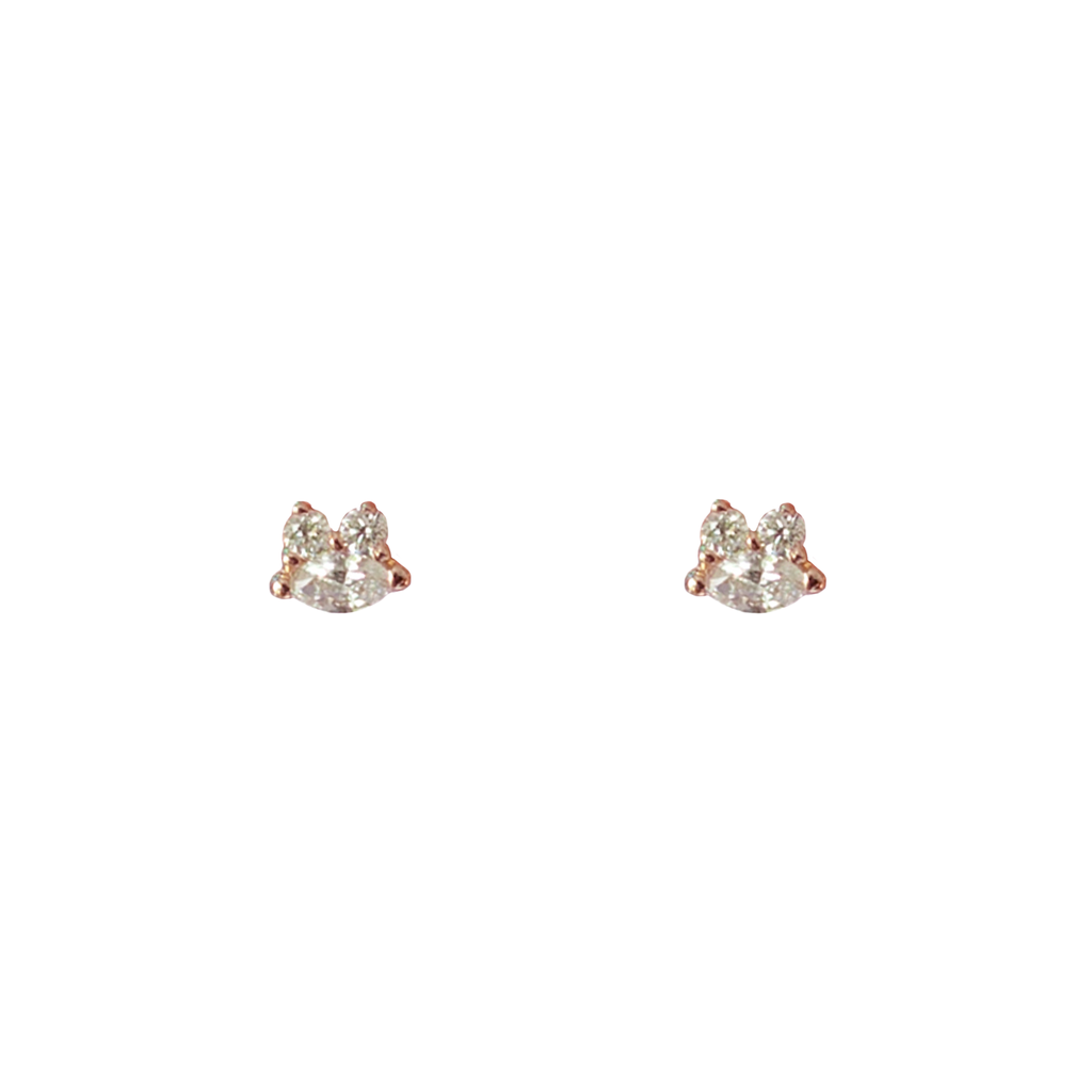 Diamond marquise dainty gold studs, made in solid 14k rose gold.