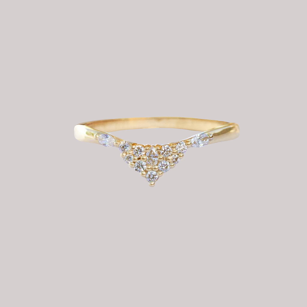 Delicate diamond crown wedding band, with marquise and round diamond contour, to trace any engagement ring style. Meant to be stacked with an engagement ring or worn on it's own. Made in 14K solid yellow gold.