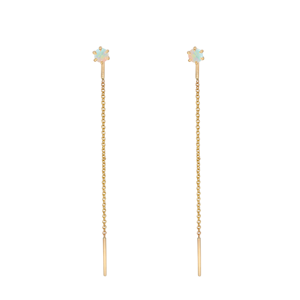 Delicate opal gold threaders, ideal for threading through multiple piercings, feature a six claw prong setting, using 14K gold.