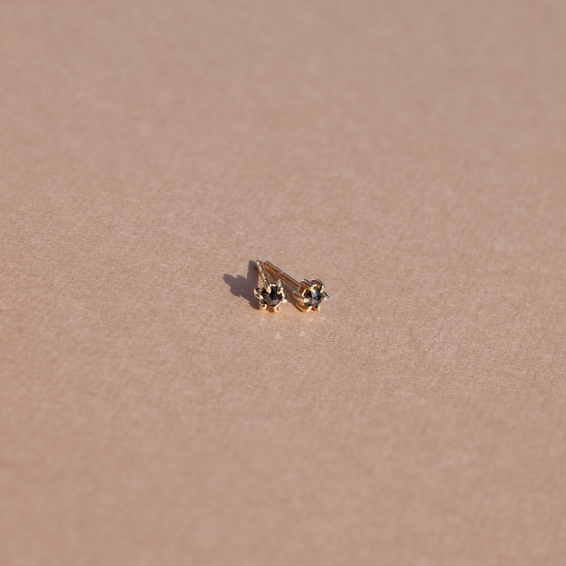Black diamond stud earrings yellow gold