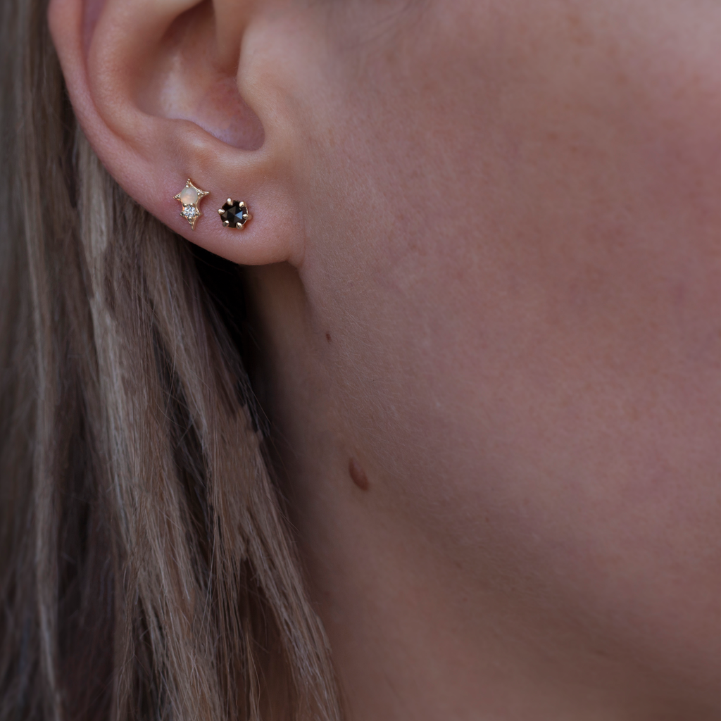 Black round rose cut diamond earring studs, set with six claw setting prongs, made in 14k or 18k yellow gold. 