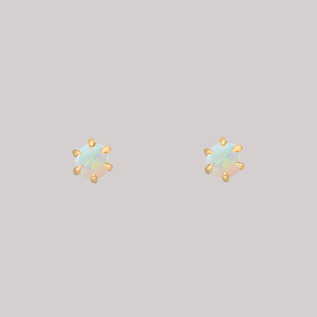 Opal earring studs, set with six claw setting prongs, made in 14k or 18k gold.