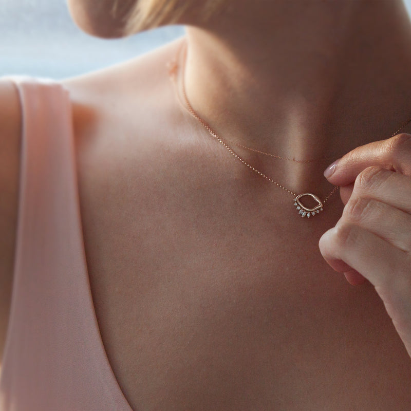 gold evil eye necklace with diamonds