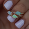 Delicate east west opal marquise everyday ring, made in 14k or 18k gold.