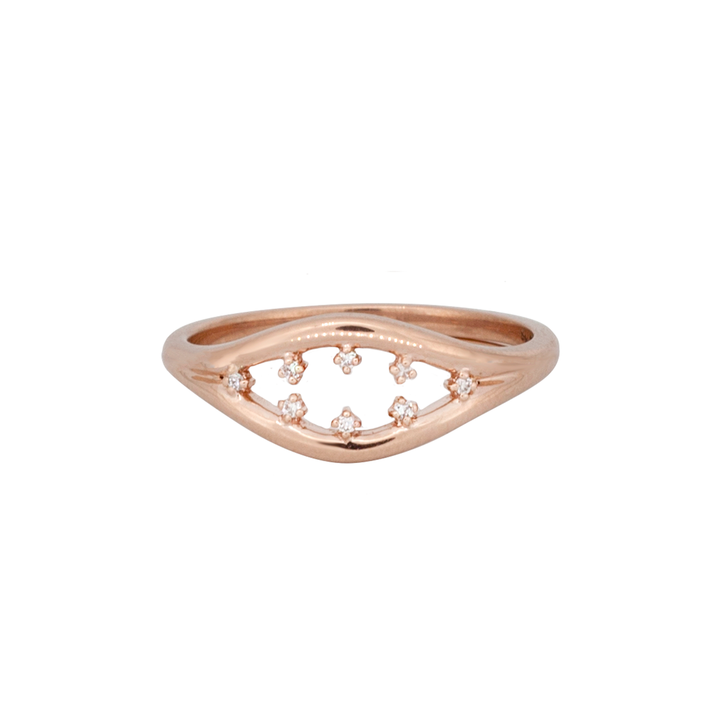 Inspired by the evil eye, this stackable ring features a contour gold and white diamond everyday ring, made in 14k or 18k rose gold.