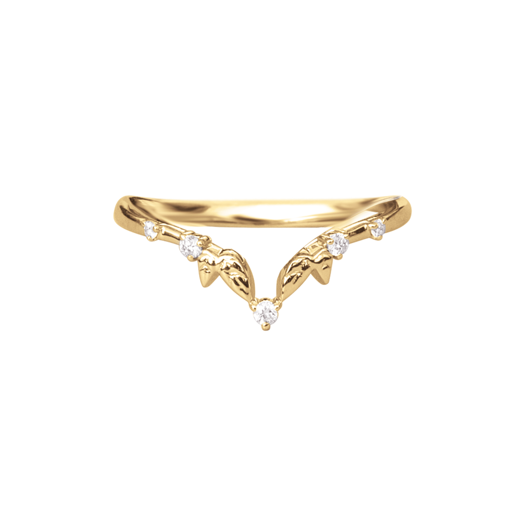 Delicate, v-shaped diamond wedding band, with organic leaves, featuring three round brilliant diamonds. Made in 14K or 18K gold.