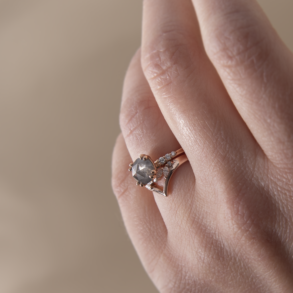 Unique solitaire diamond engagement ring, featuring a round salt and pepper rose cut diamond centre stone, set with four rounded double prongs, made in 14k or 18K gold.