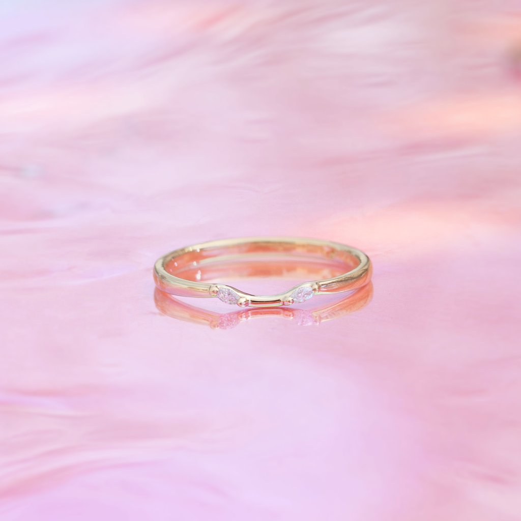 Delicate diamond contour band has a gentle wave design to trace and pair with any engagement ring, whether it’s a solitaire or a halo. This ring is also a perfect everyday stackable ring that can be stacked with your favourite everyday staples, or worn on its own. Made in 14k solid gold.