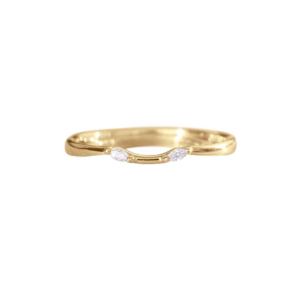 Delicate diamond contour band has a gentle wave design to trace and pair with any engagement ring, whether it’s a solitaire or a halo. This ring is also a perfect everyday stackable ring that can be stacked with your favourite everyday staples, or worn on its own. Made in 14k solid gold. 