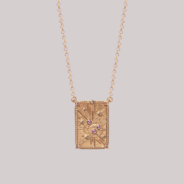 Light code charm, with sacred geometry, made in 14k or 18k gold, with light pink sapphires and champagne diamonds. 
