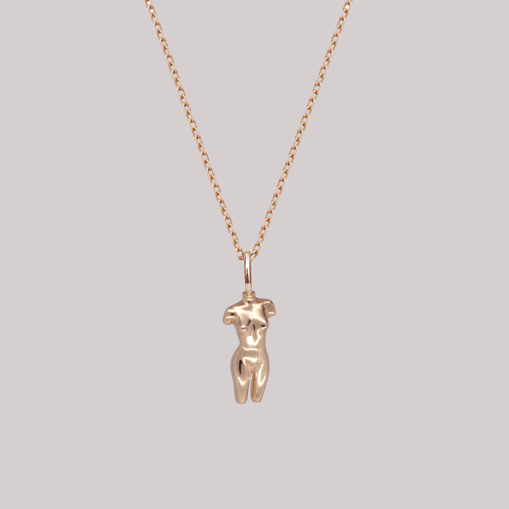 Dainty gold body charm statuette made in 14K or 18K solid gold.