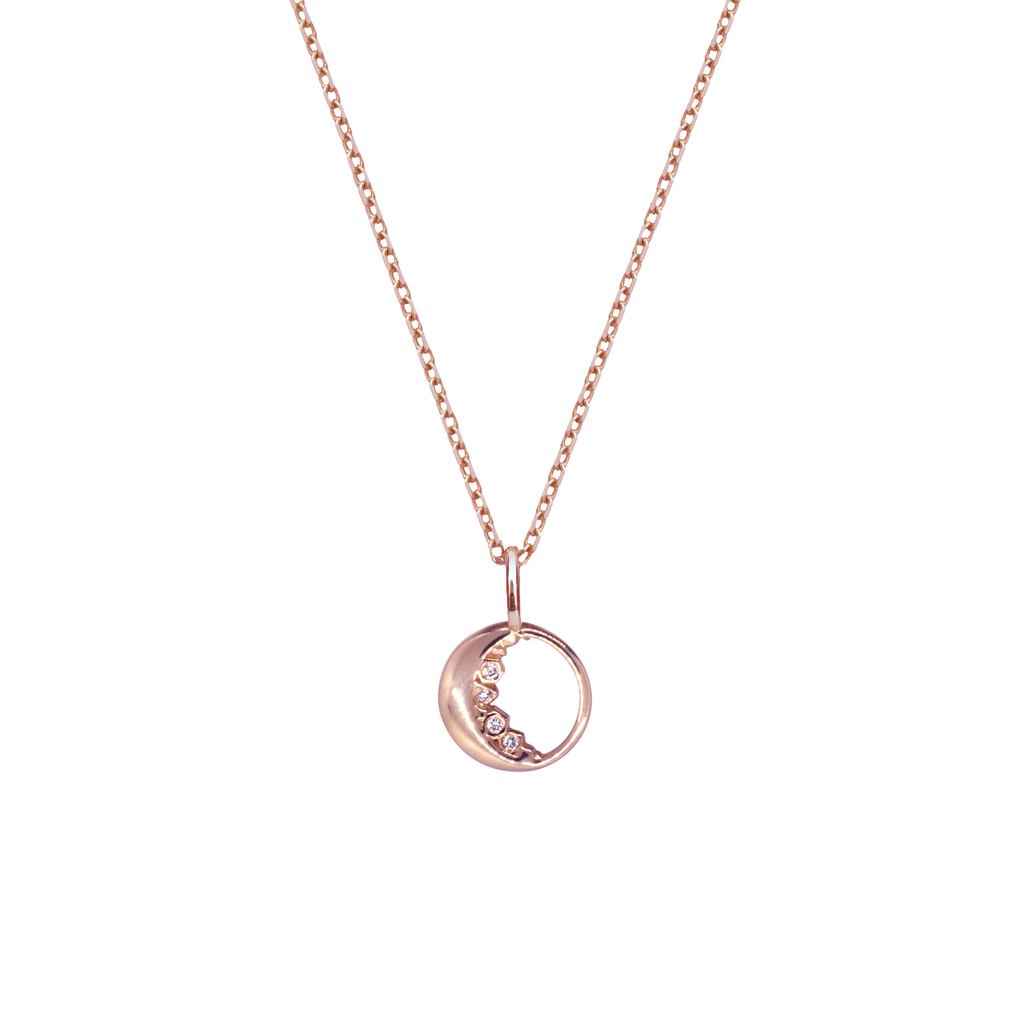 Dainty gold moon charm encrusted with the tiniest of diamonds made in 14K or 18K solid rose gold.