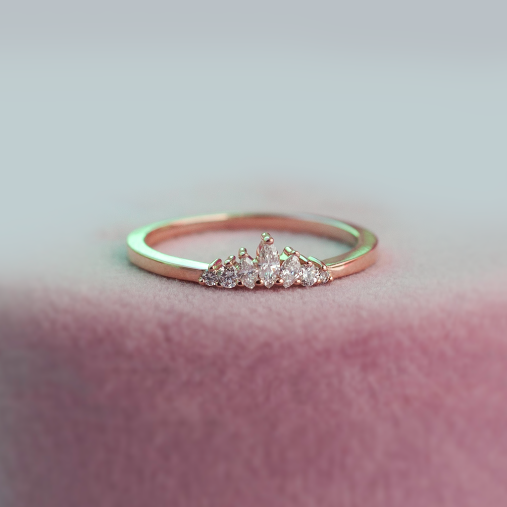 Delicate diamond crown wedding band, with gengle countour, to trace any engagement ring style. Meant to be stacked with an engagement ring or worn on it's own. Made in 14K rose gold.
