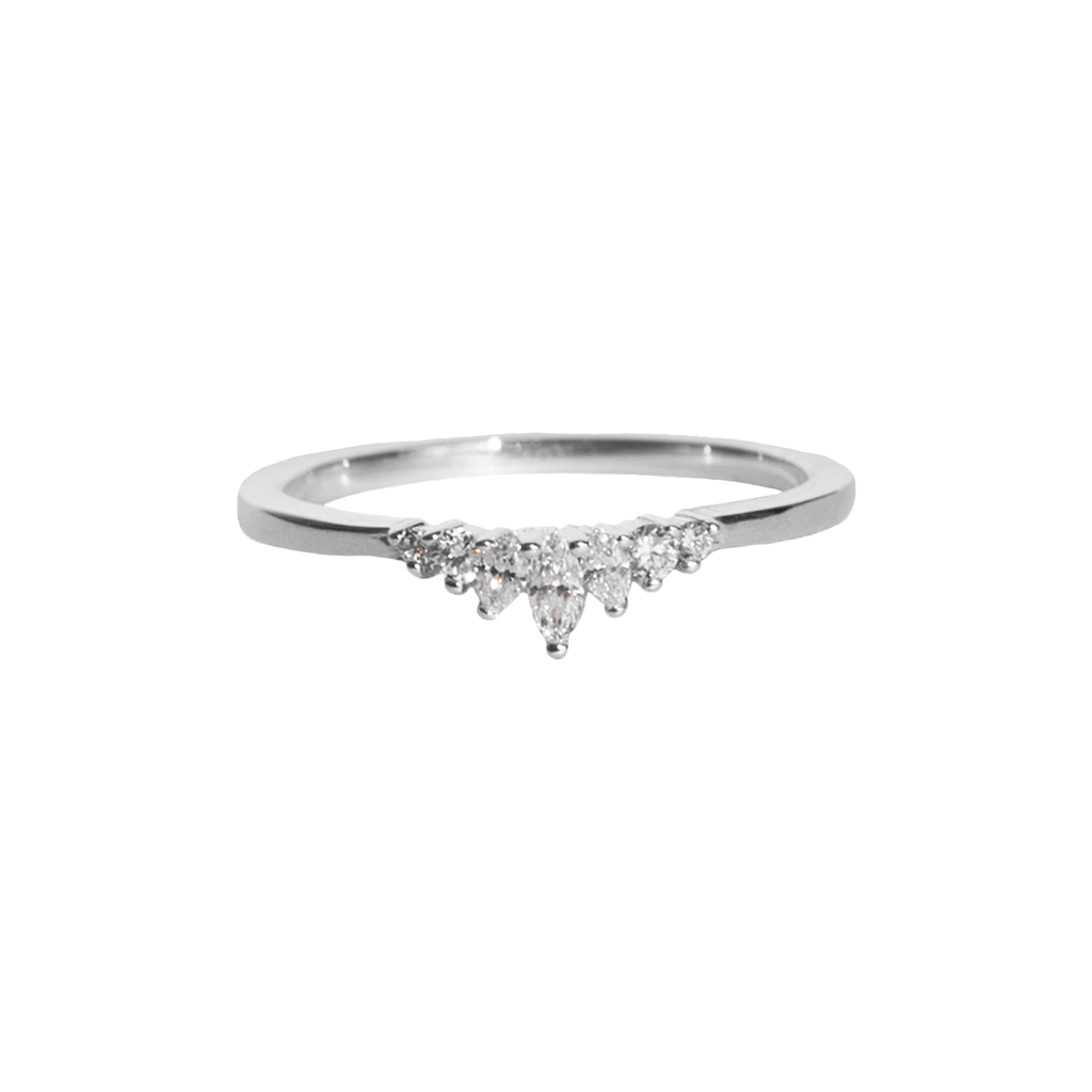 Delicate diamond crown wedding band, with gengle countour, to trace any engagement ring style. Meant to be stacked with an engagement ring or worn on it's own. Made in 14K white gold.
